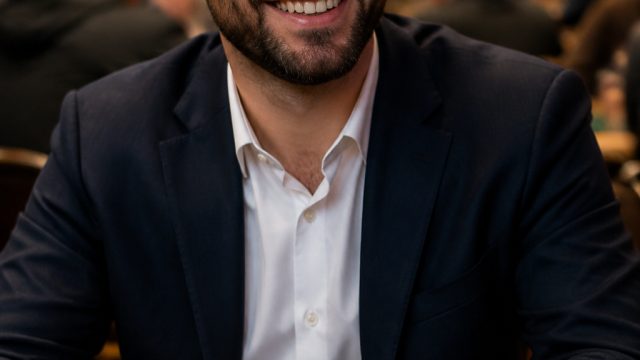 Micah Lasher Secures Primary Win Amidst AI Investment Surge